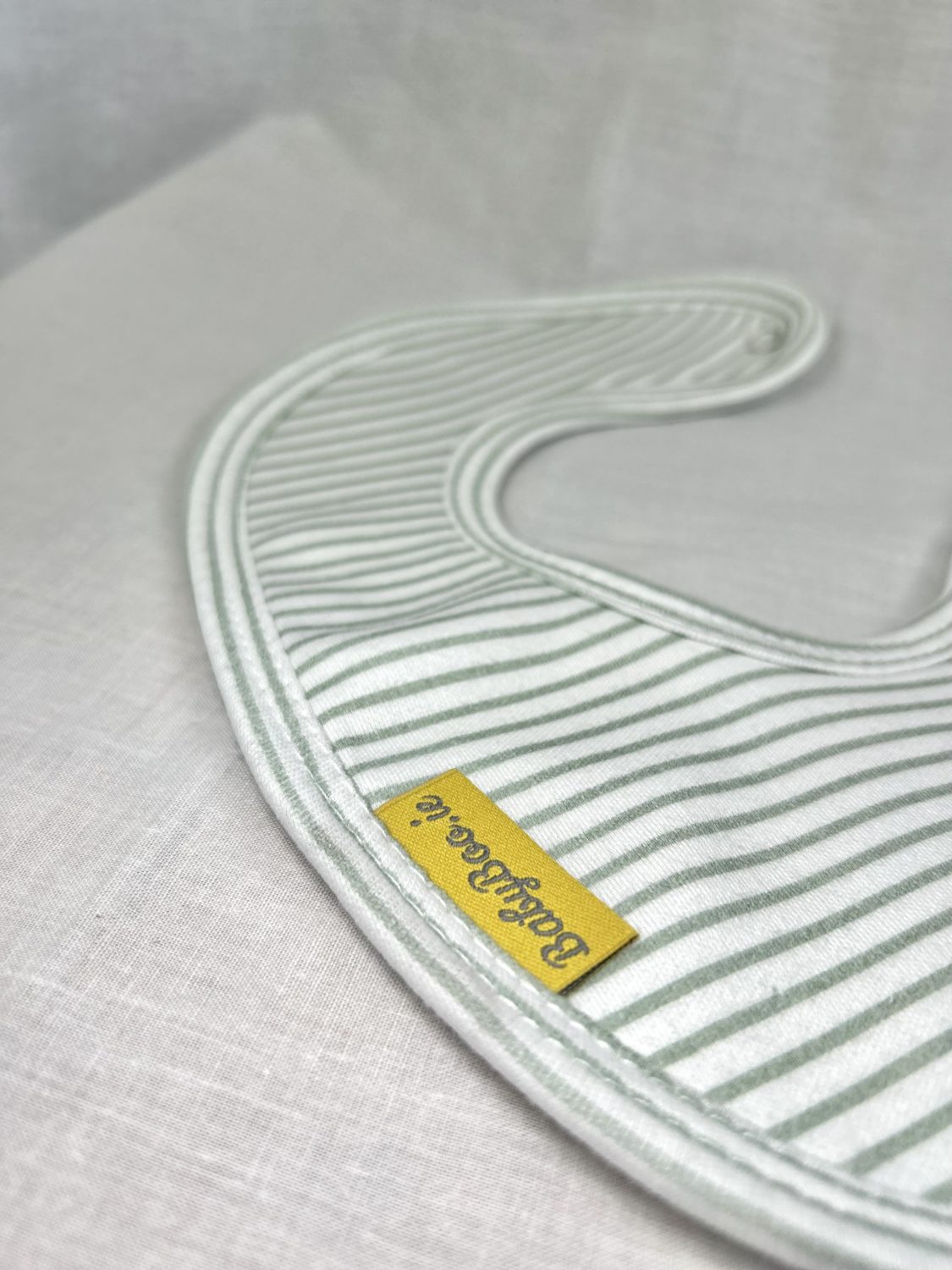 Sage stripes organic cotton LittleBoo baby bib