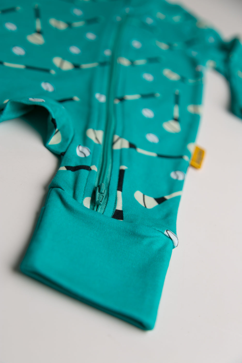 Teal GAA organic cotton ZippyBoo suit