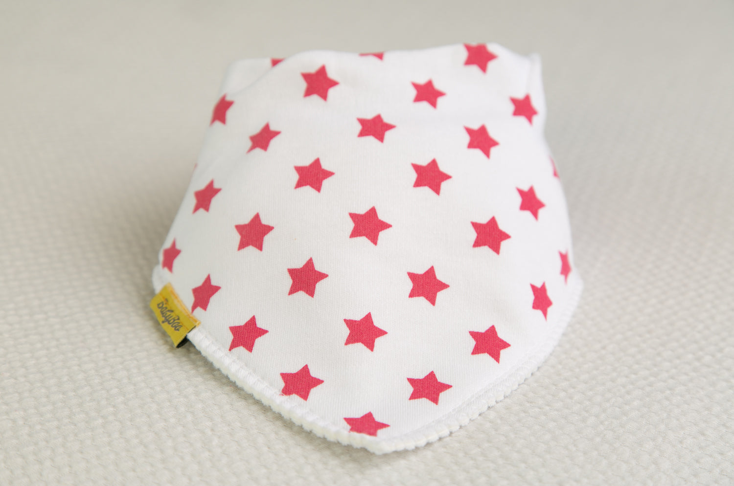 White with hot pink stars organic cotton DribbleBoo bandana bib