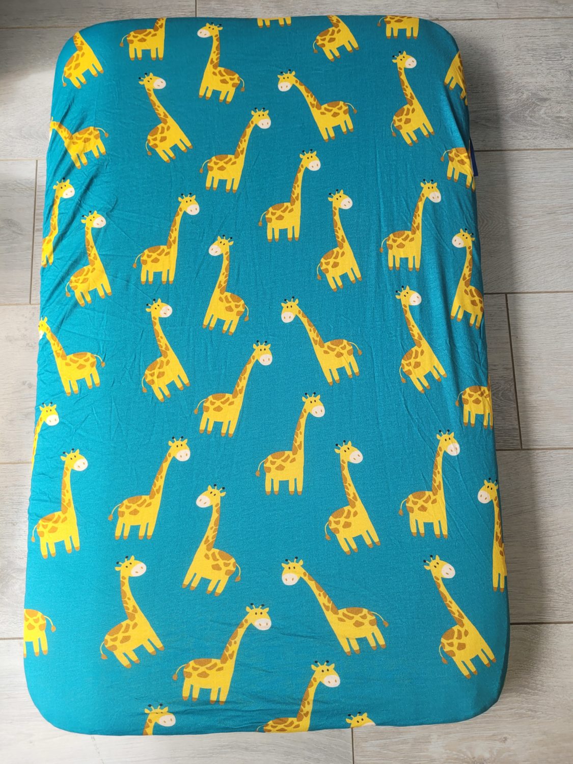 Teal Gerry giraffe organic cotton BeddyBoo fitted sheet