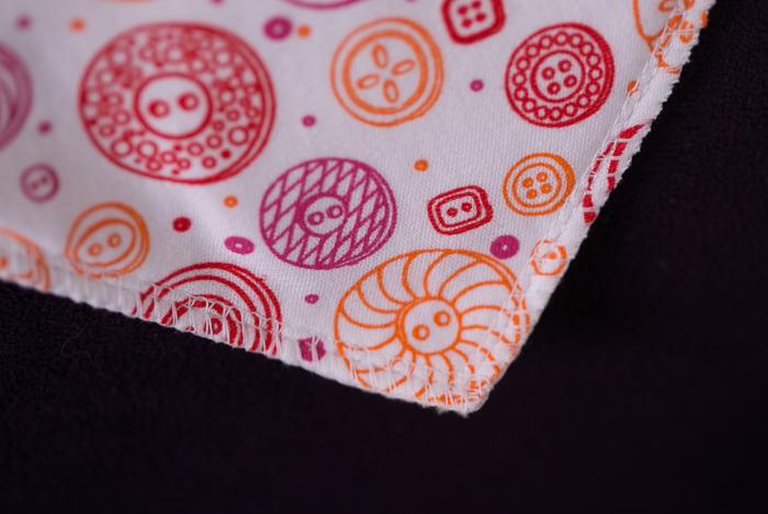 Pink buttons organic cotton DribbleBoo bandana bib