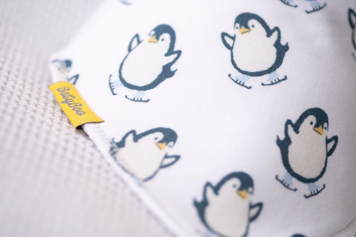 Skating penguins organic cotton DribbleBoo bandana bib