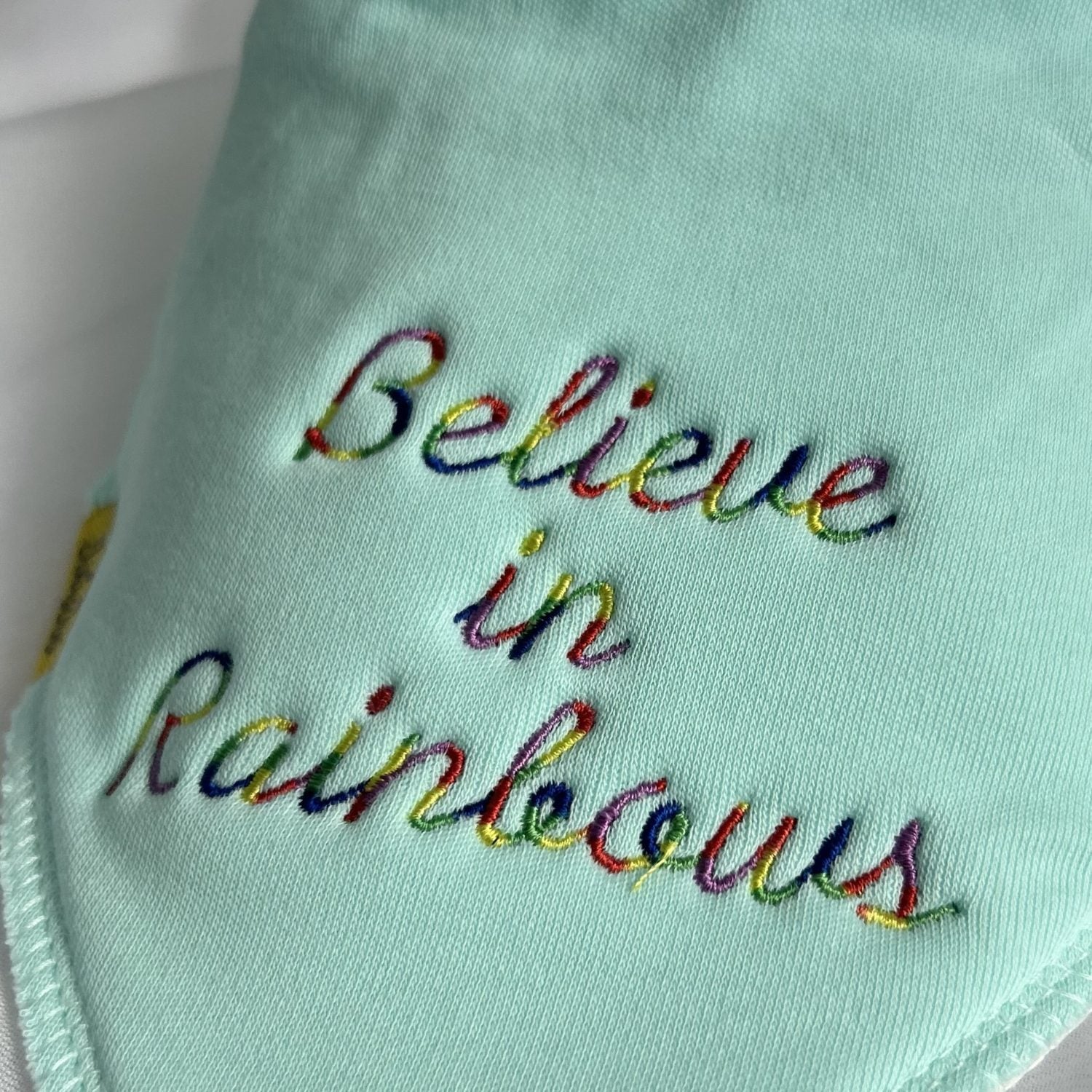 Believe in Rainbows organic cotton DribbleBoo bandana bib