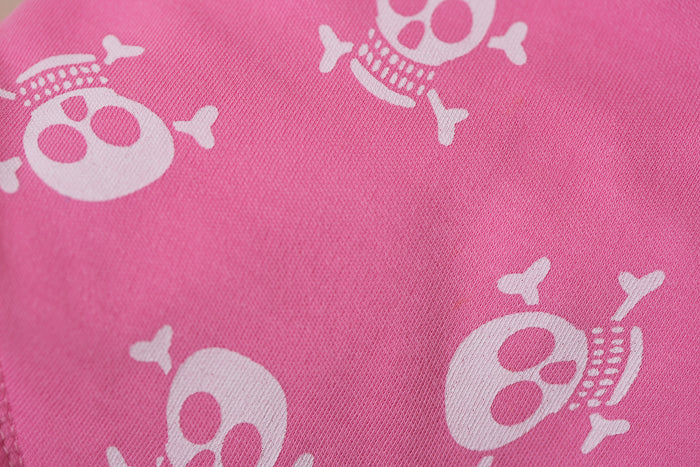 Skull and crossbone pink organic cotton DribbleBoo bandana bib