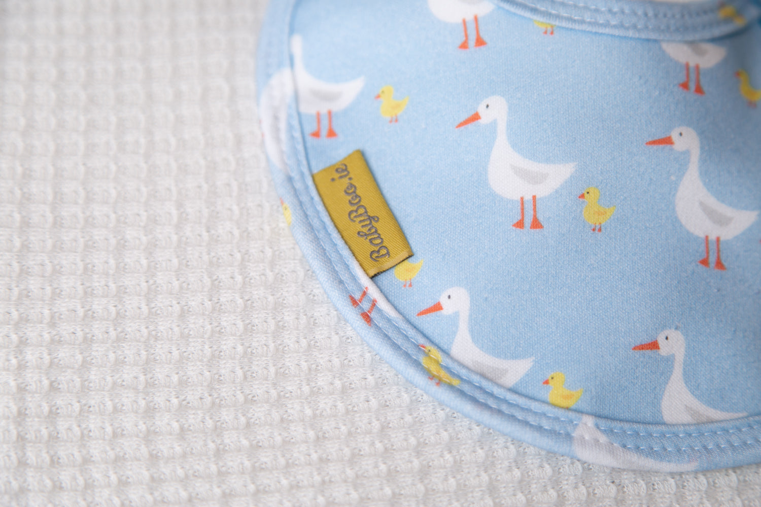 Blue duckies organic cotton LittleBoo baby bib