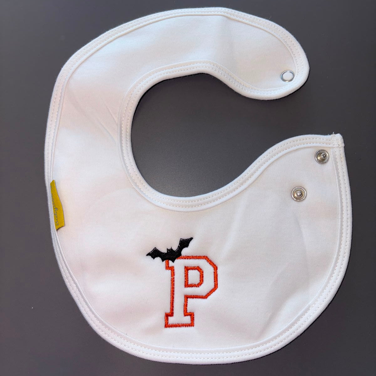 Letterman with bat organic cotton LittleBoo newborn bib