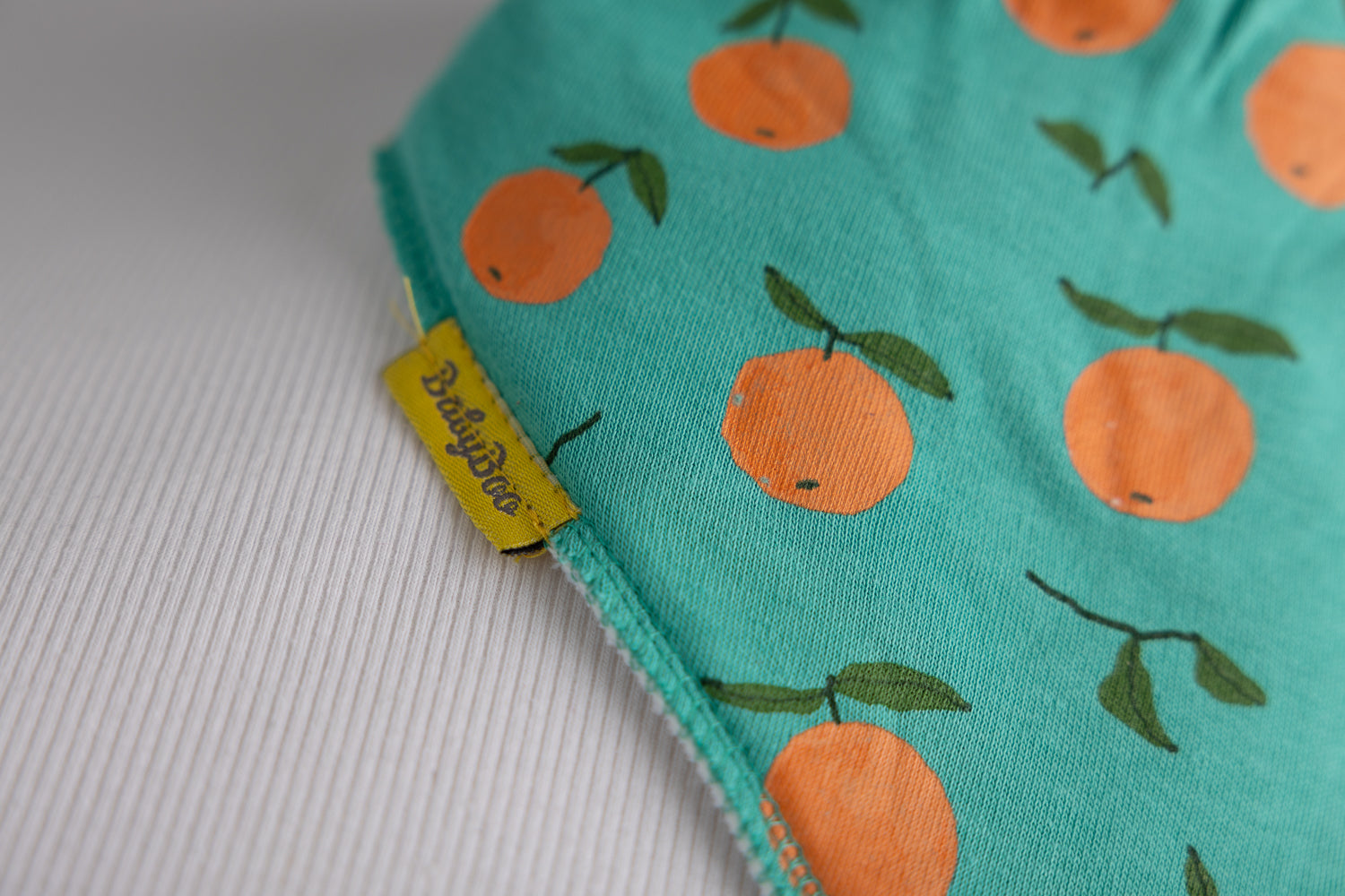 Teal tangerines organic cotton DribbleBoo bandana bib