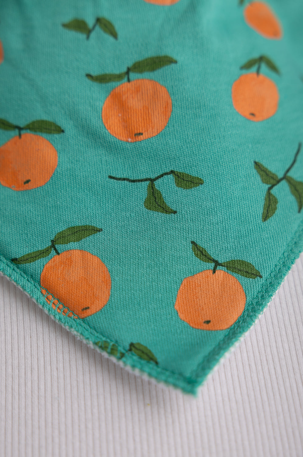 Teal tangerines organic cotton DribbleBoo bandana bib