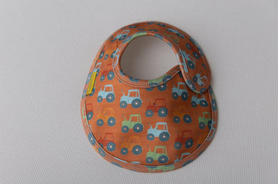 Rust tractors organic cotton LittleBoo baby bib