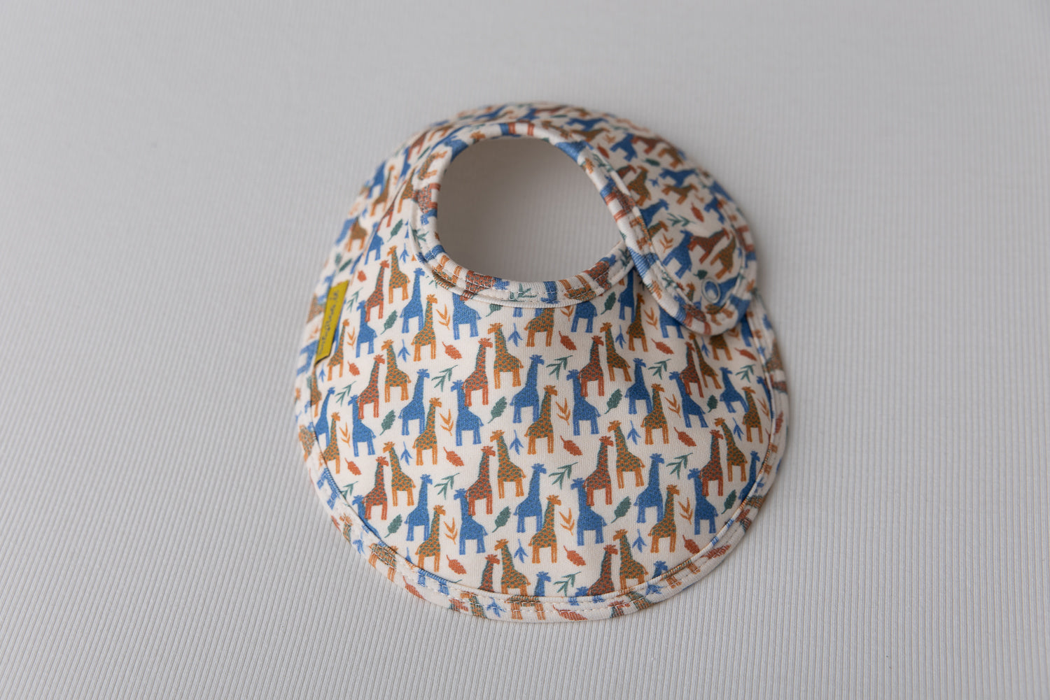 Colourful Giraffes organic cotton LittleBoo baby bib