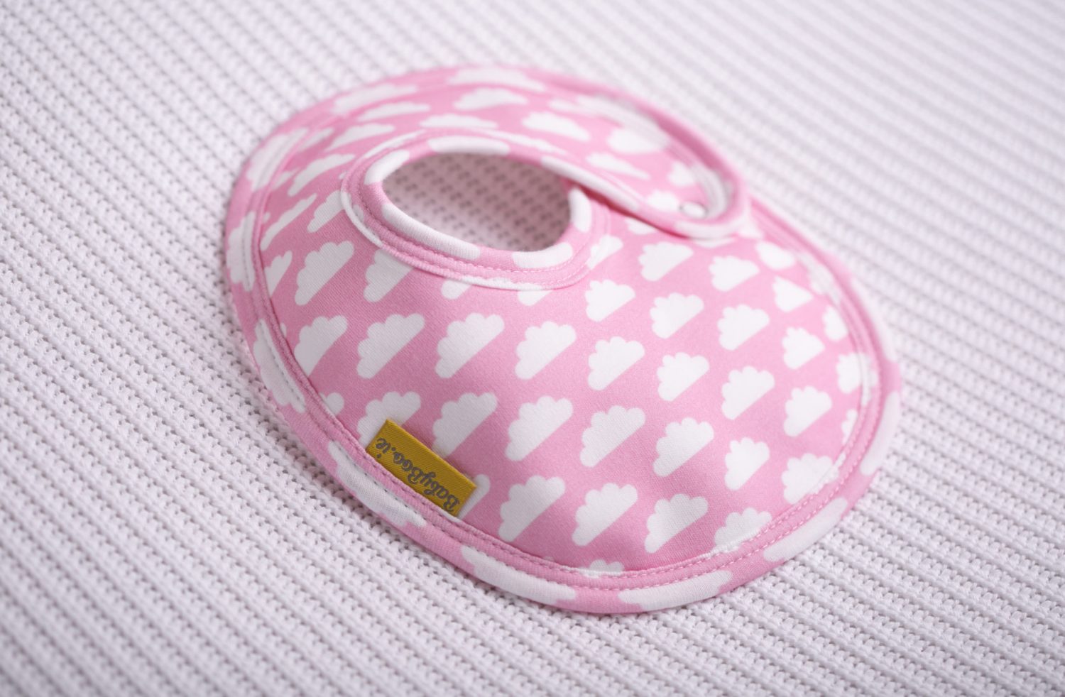 Pink with white clouds organic cotton LittleBoo baby bib