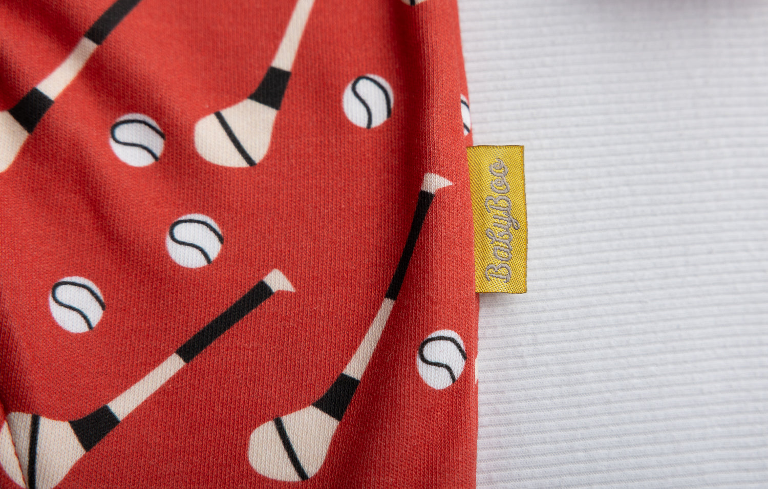 Red GAA organic cotton ZippyBoo suit