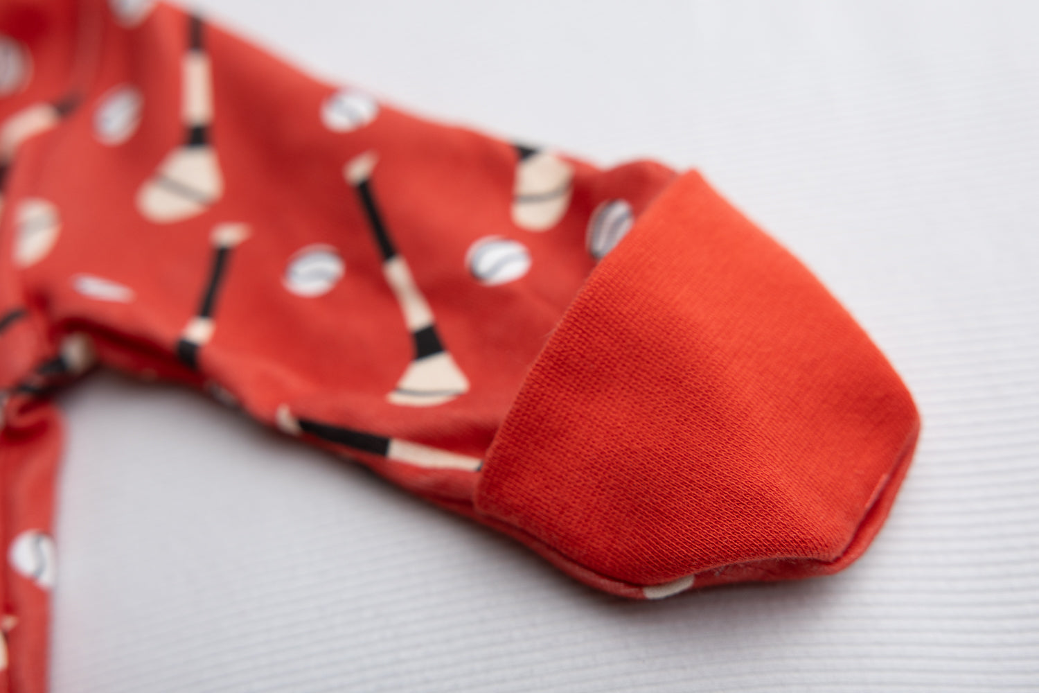 Red GAA organic cotton ZippyBoo suit