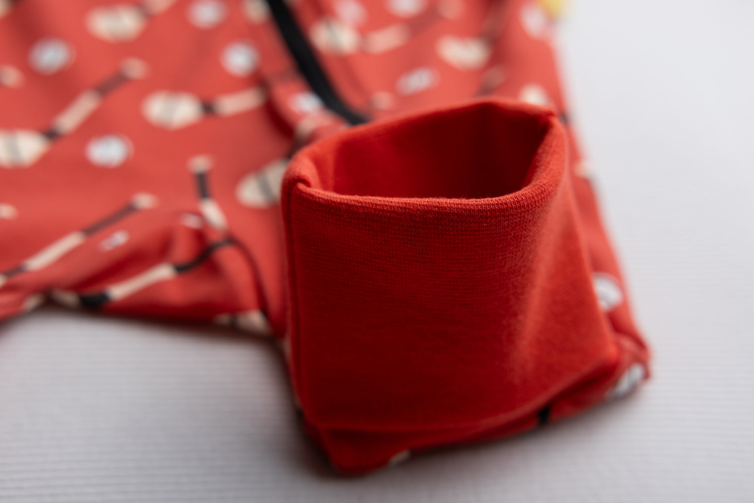 Red GAA organic cotton ZippyBoo suit