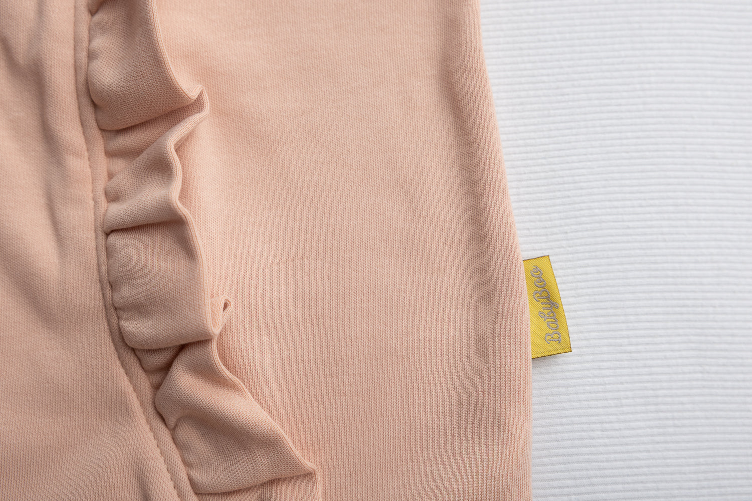 Peach ruffle organic cotton ZippyBoo suit