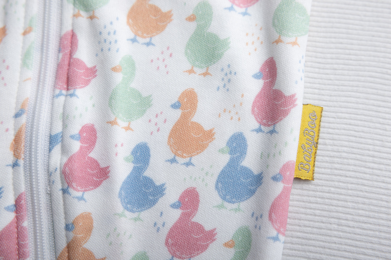 Pastel Ducks organic cotton ZippyBoo suit
