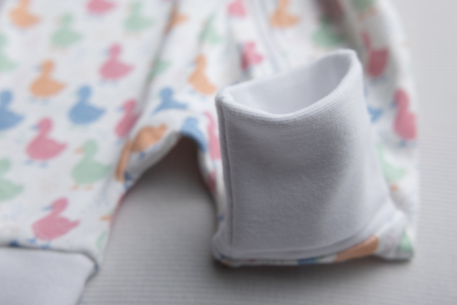 Pastel Ducks organic cotton ZippyBoo suit