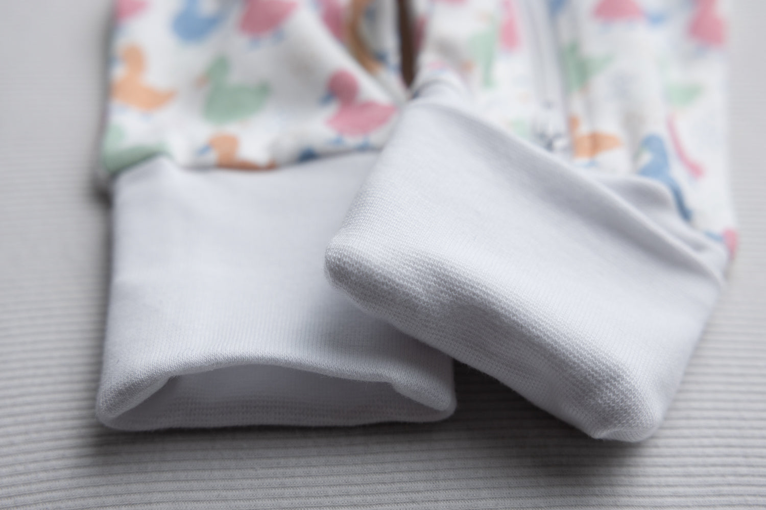 Pastel Ducks organic cotton ZippyBoo suit