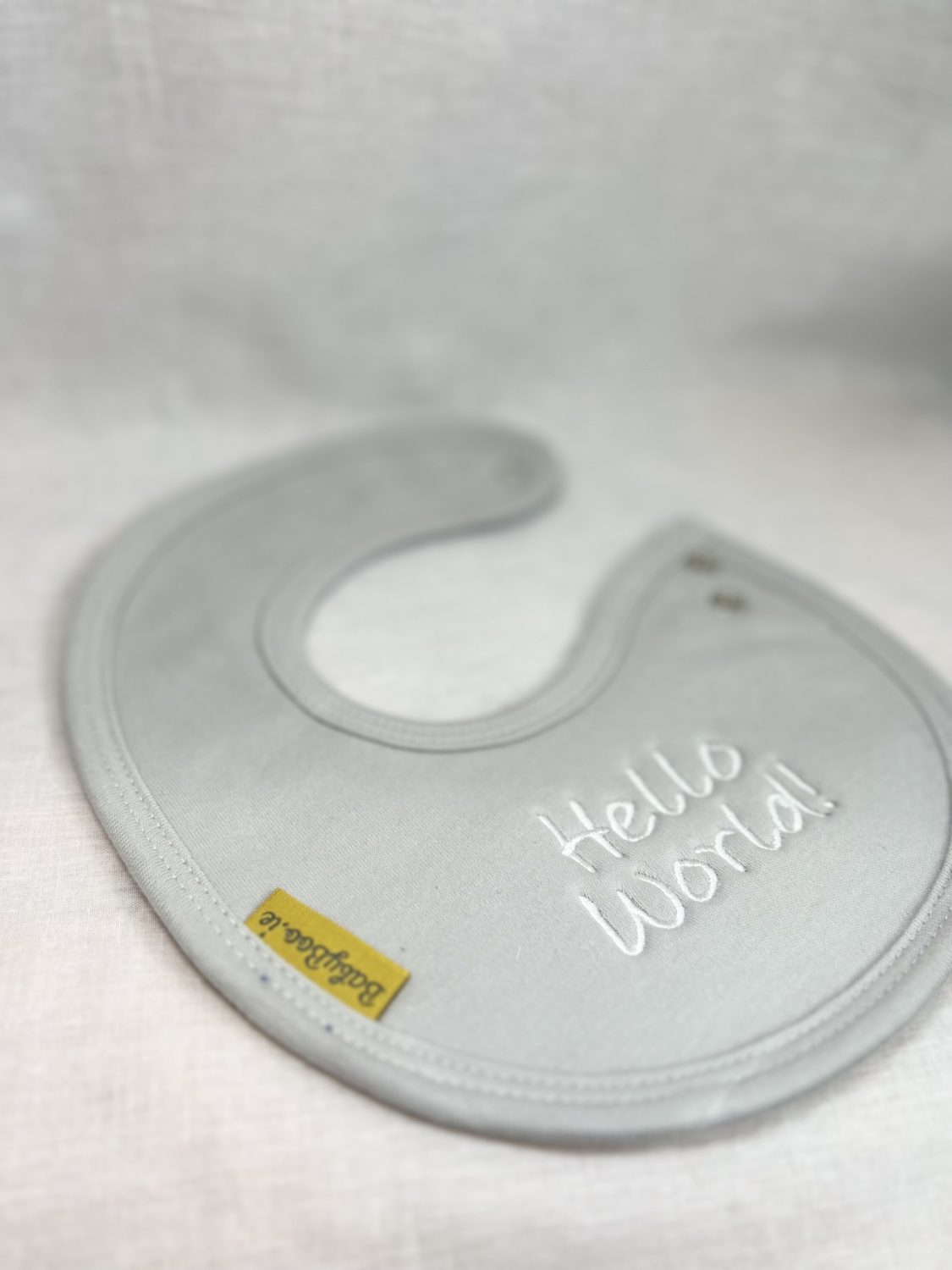 Hello World! organic cotton LittleBoo newborn bib