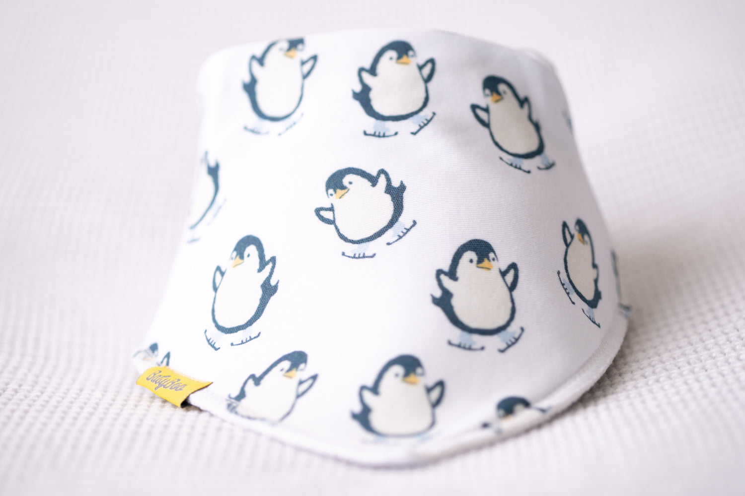 Skating penguins organic cotton DribbleBoo bandana bib