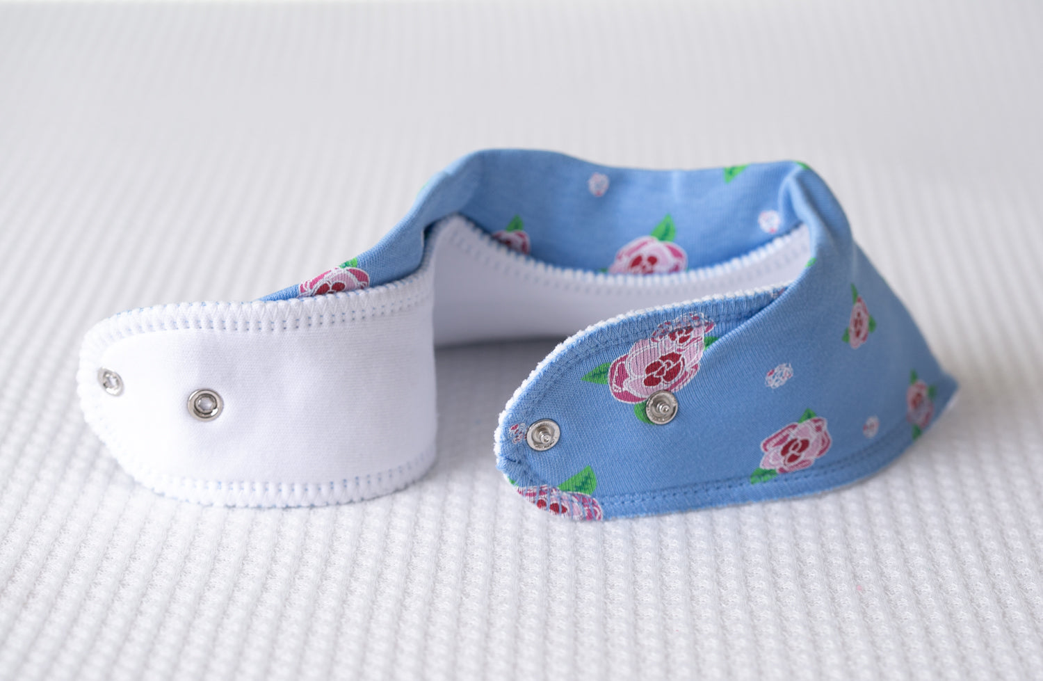 Blue roses organic cotton DribbleBoo bandana bib