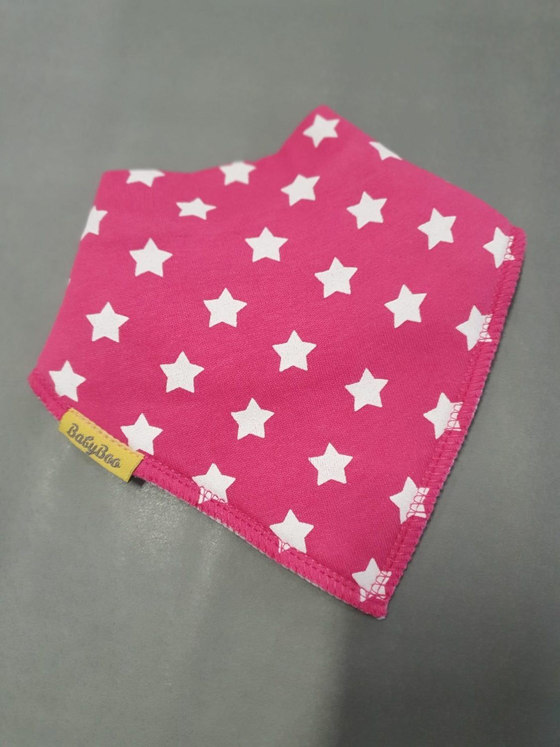 Hot pink with white stars organic cotton DribbleBoo bandana bib