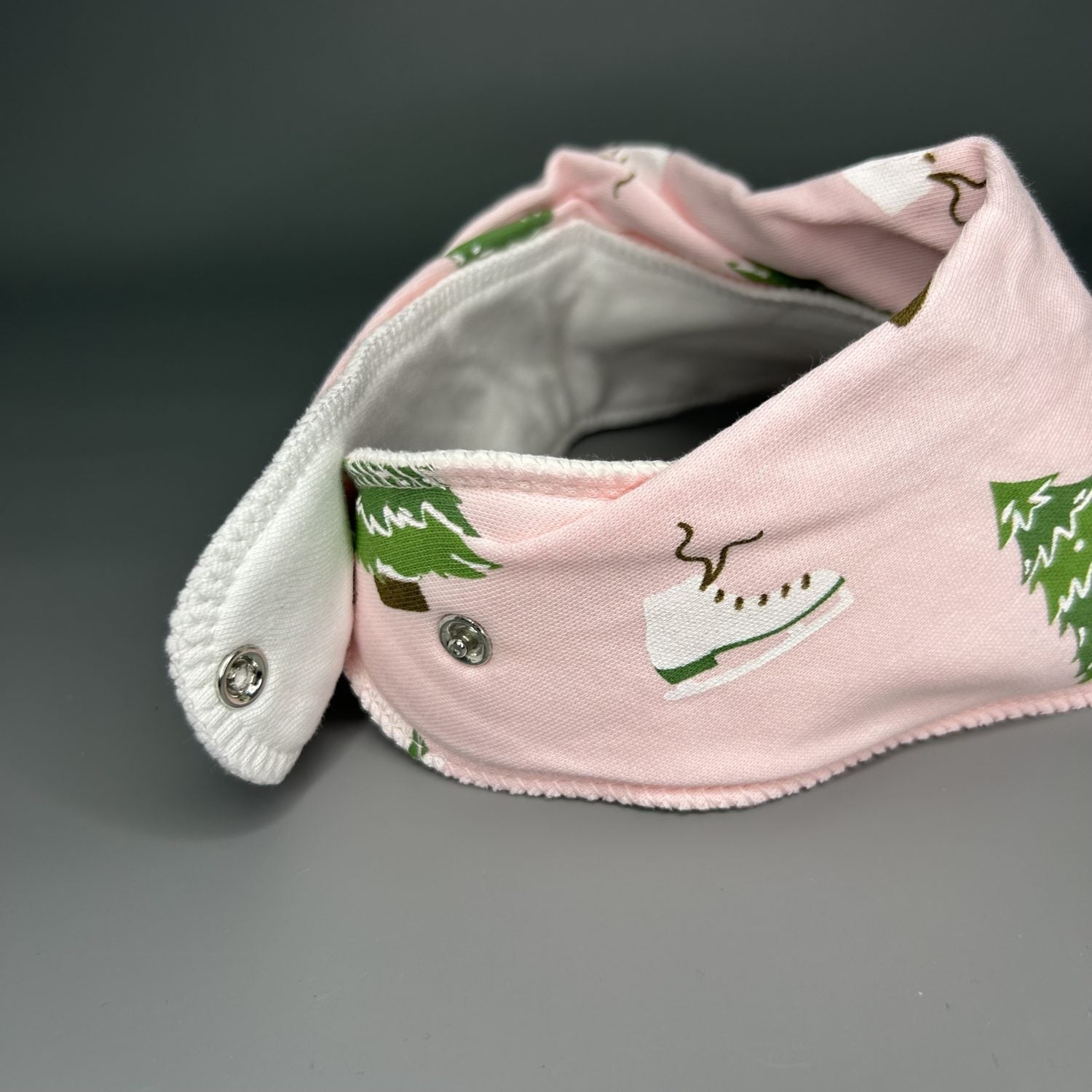 Skating at Christmas organic cotton DribbleBoo bandana bib