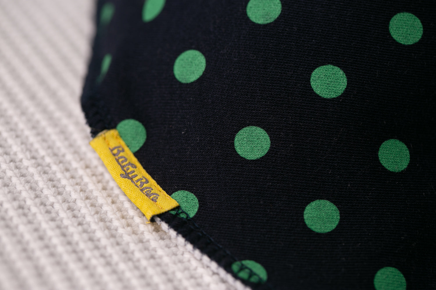 Navy with green polka organic cotton DribbleBoo bandana bib