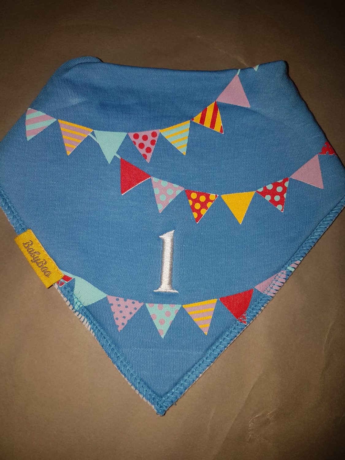 Party time organic cotton DribbleBoo bandana bib with age
