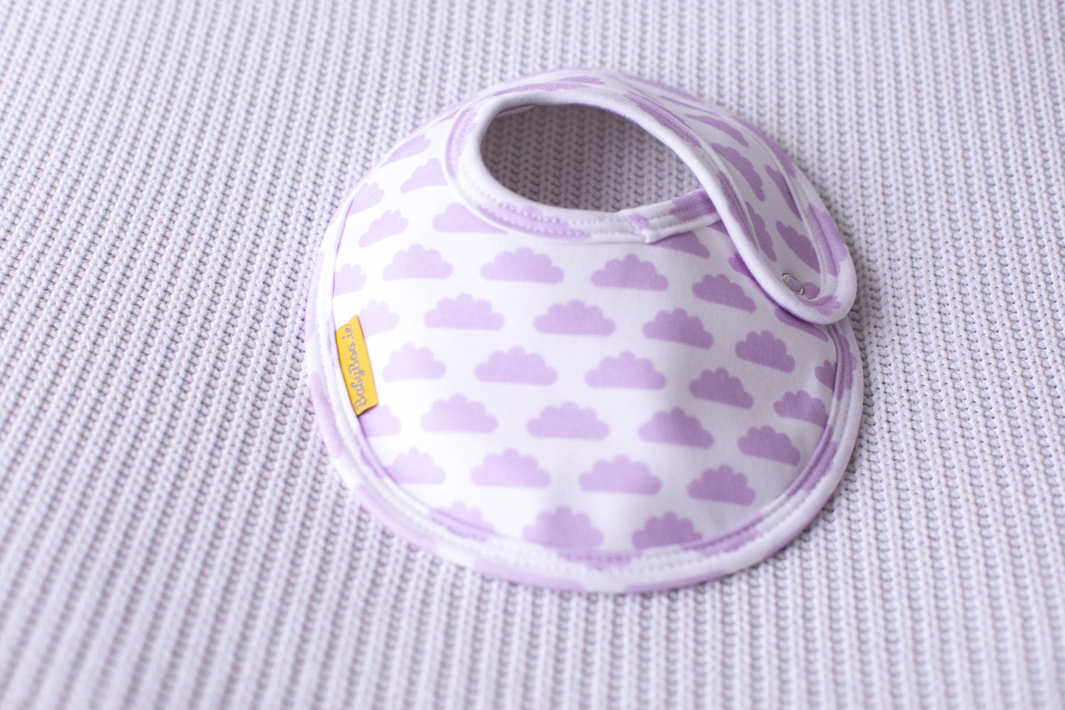 White with lilac clouds organic cotton LittleBoo baby bib