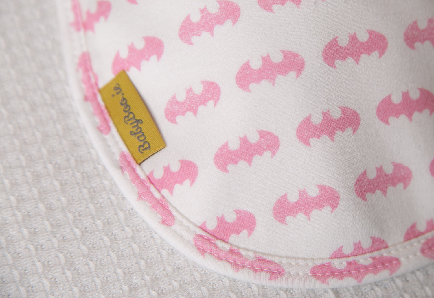 Pink Batman organic cotton LittleBoo baby bib