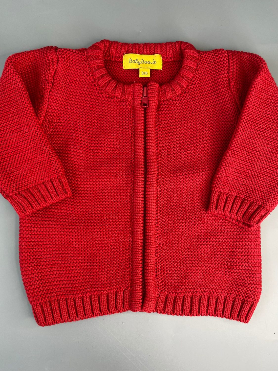 Red organic cotton zipped cardigan