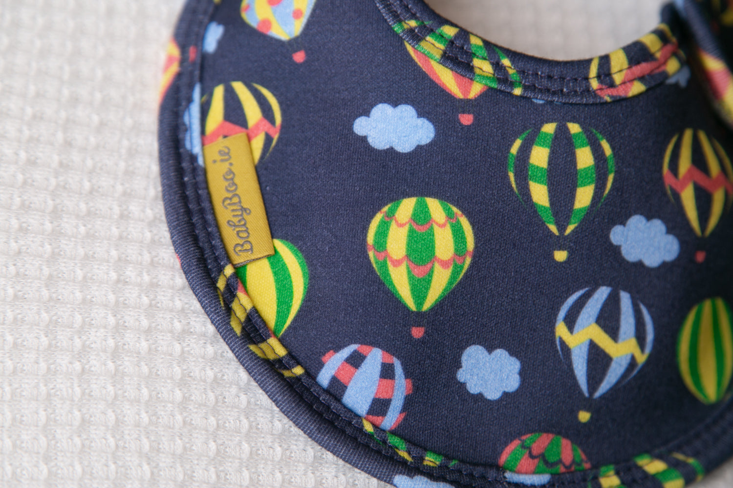 Navy hot air balloons organic cotton LittleBoo baby bib