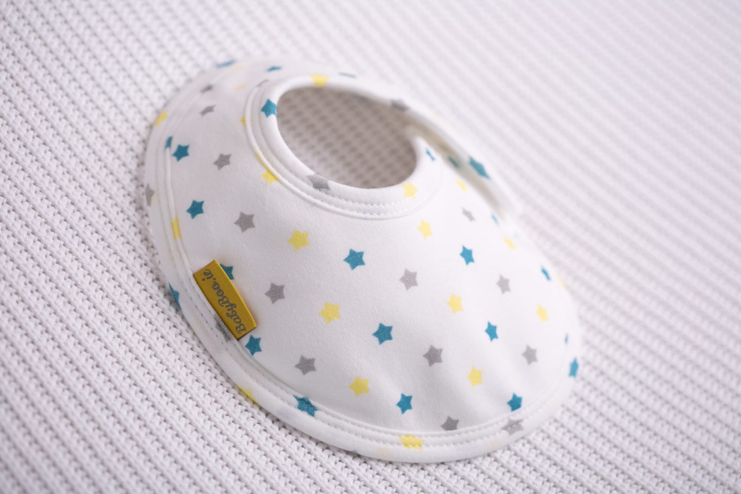 Teal, lemon and grey stars organic cotton LittleBoo baby bib