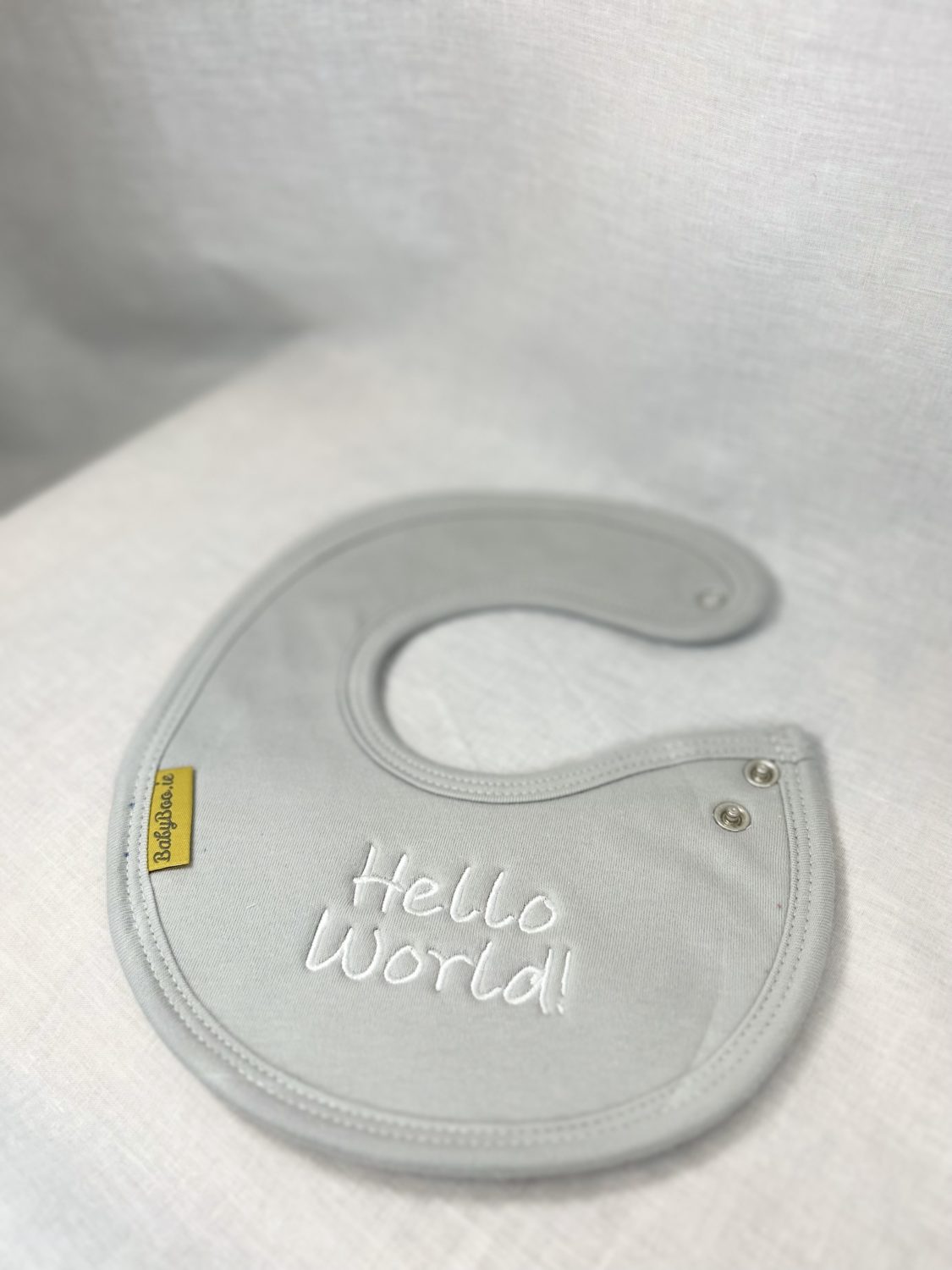 Hello World! organic cotton LittleBoo newborn bib