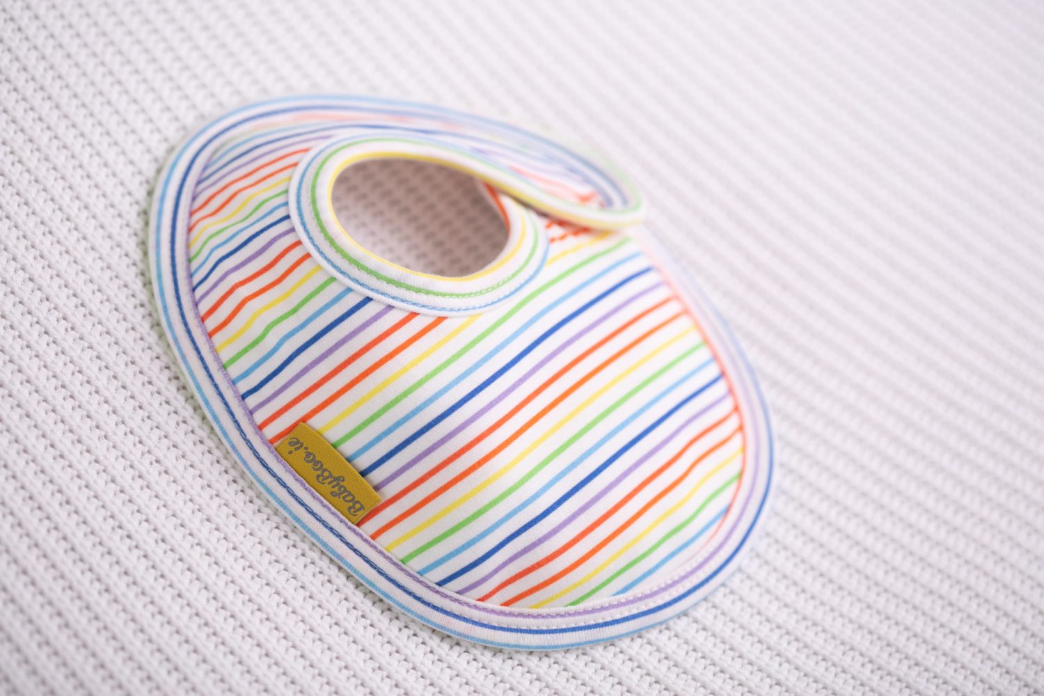 Rainbow stripes organic cotton LittleBoo baby bib