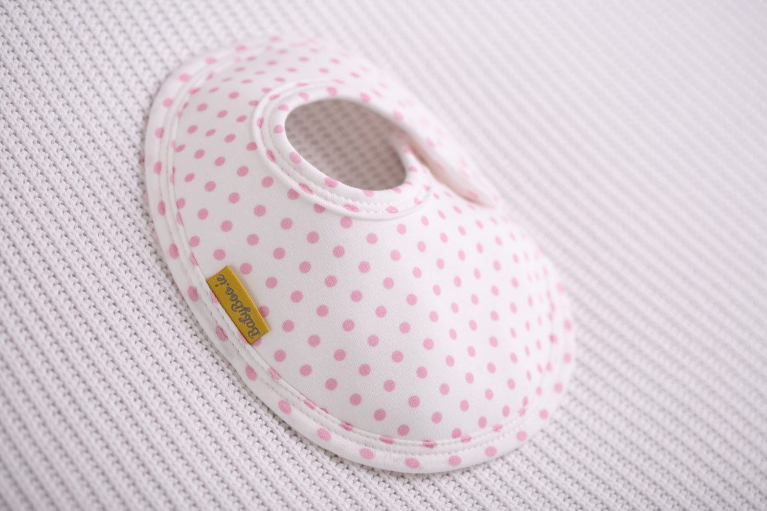 Pink polka organic cotton LittleBoo baby bib