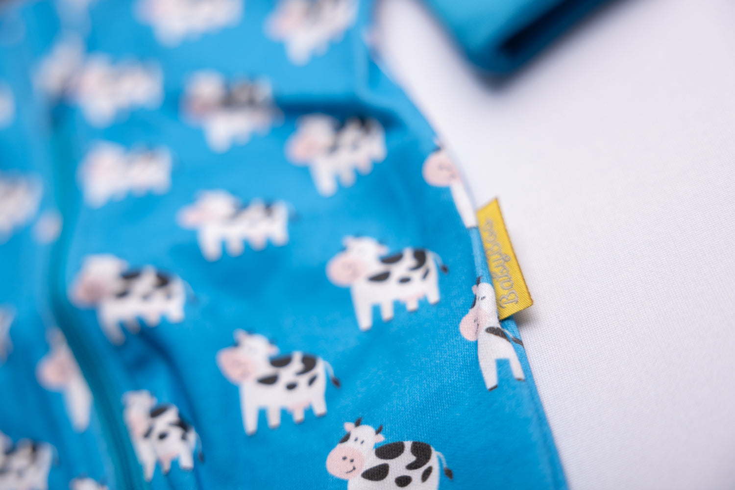 Blue Bessie Cow organic cotton ZippyBoo suit