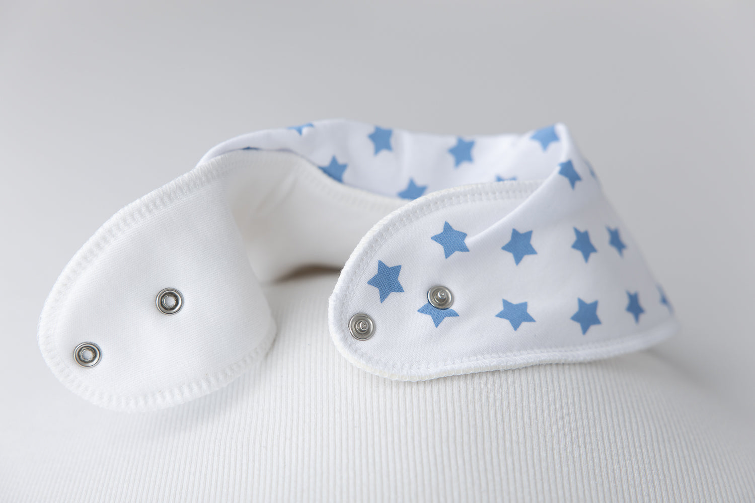 White with blue stars organic cotton DribbleBoo bandana bib