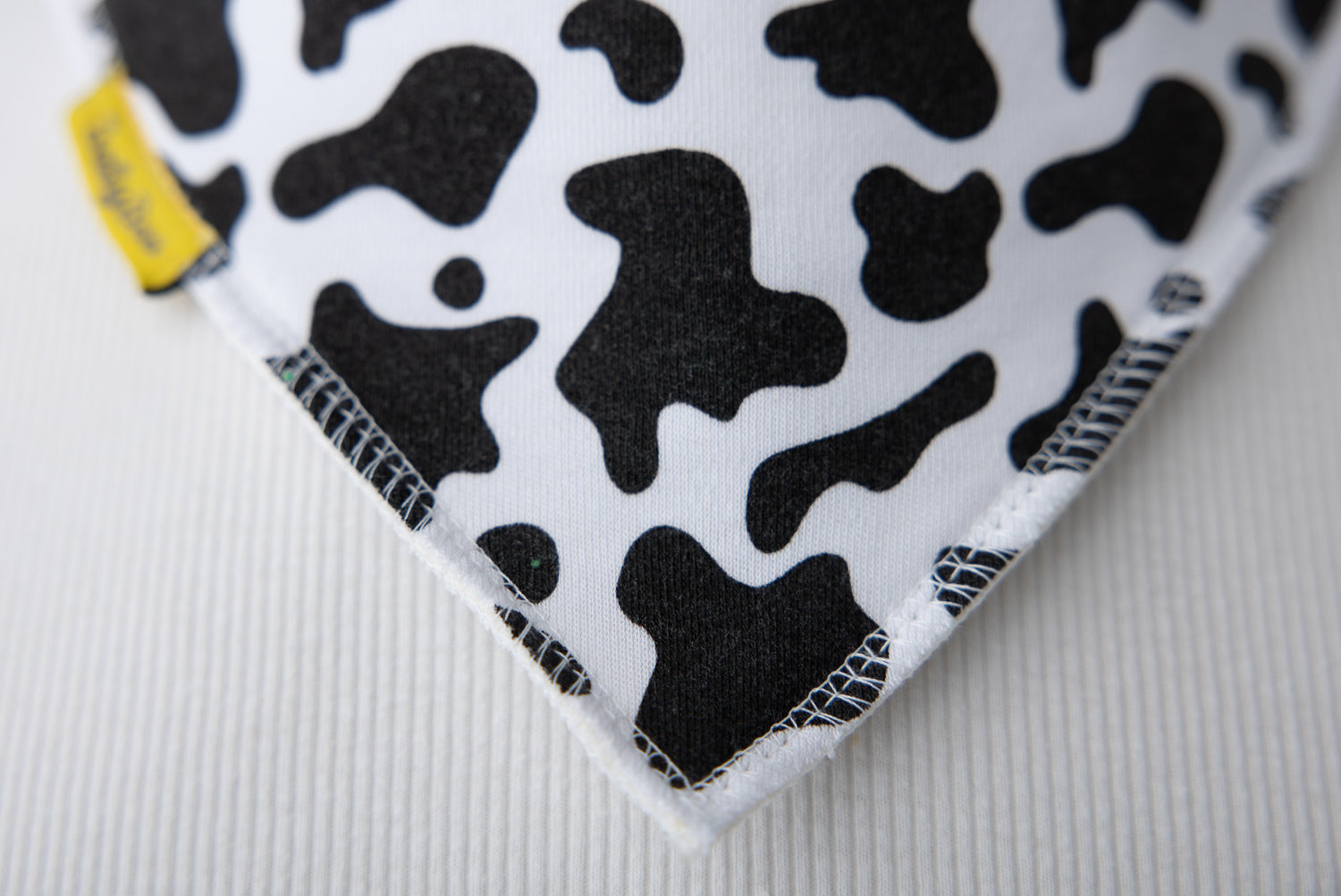 Moo print organic cotton DribbleBoo bandana bib