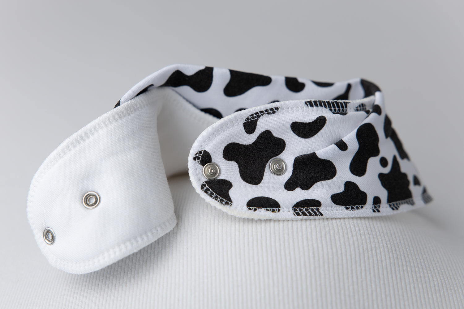 Moo print organic cotton DribbleBoo bandana bib