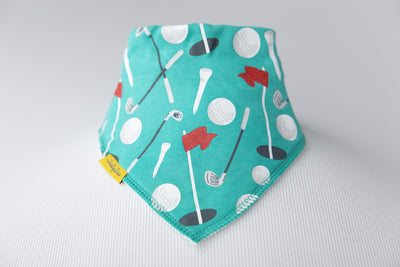 Teeing off organic cotton DribbleBoo bandana bib