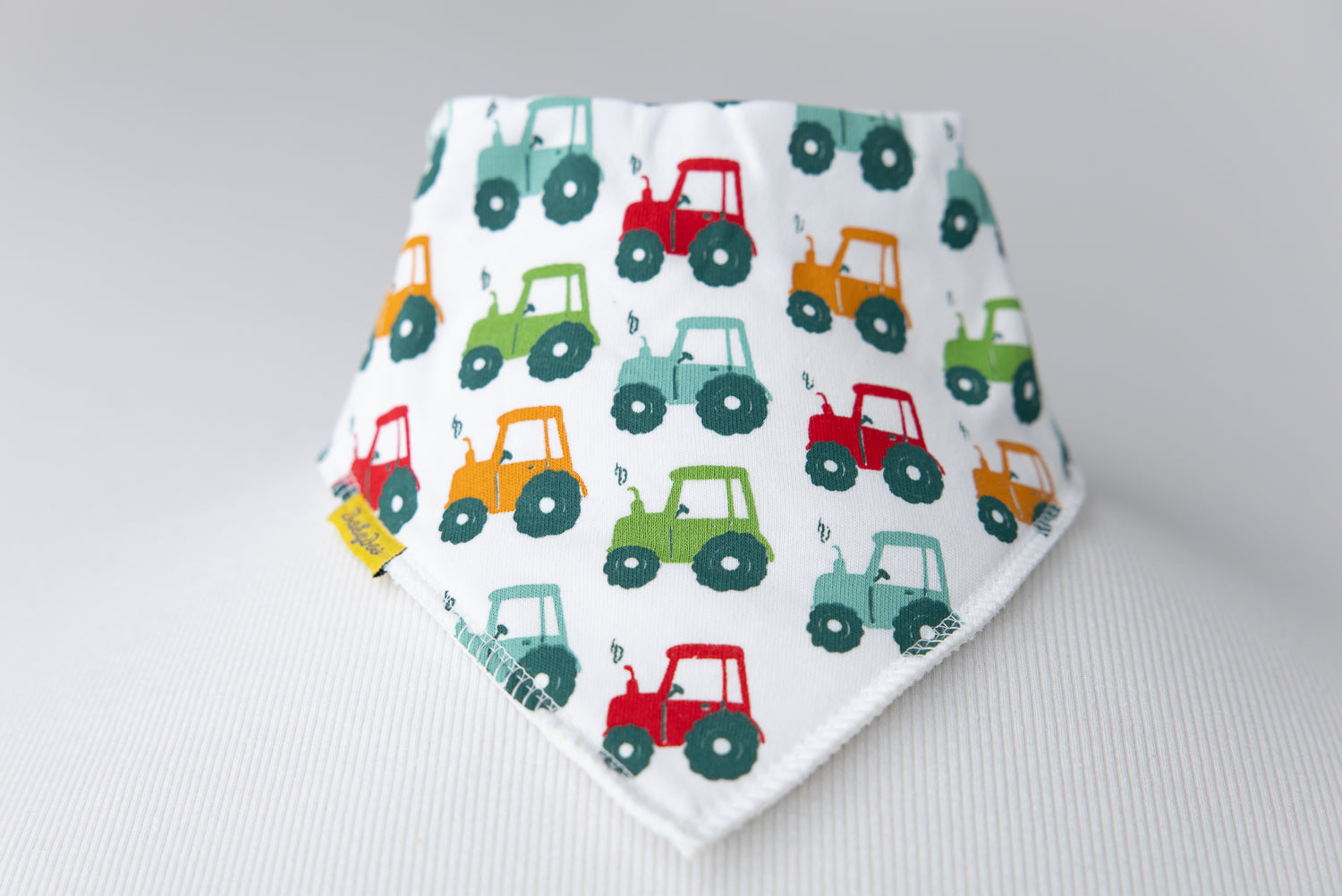 Tractor run white organic cotton DribbleBoo bandana bib