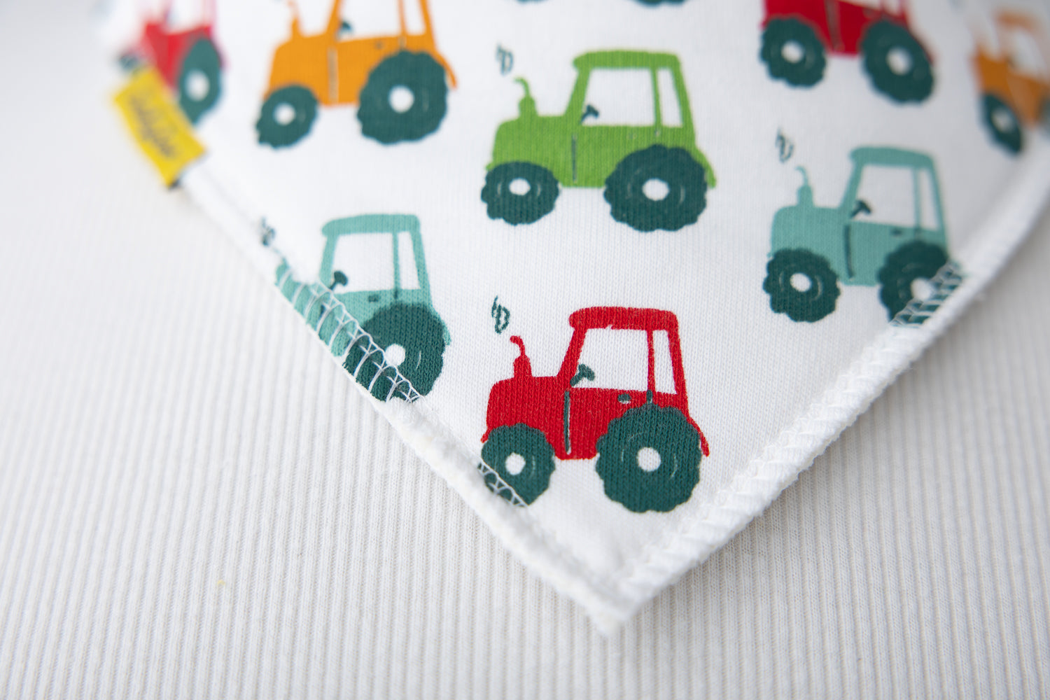 Tractor run white organic cotton DribbleBoo bandana bib