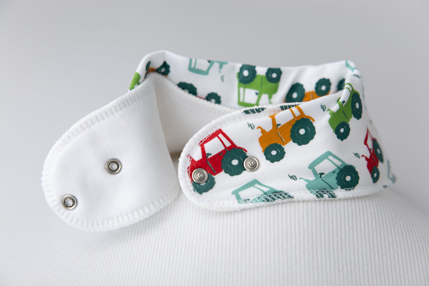 Tractor run white organic cotton DribbleBoo bandana bib