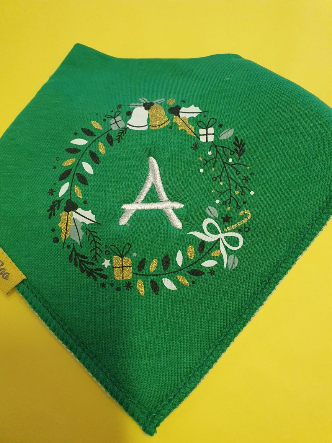 Personalised holly wreath organic cotton DribbleBoo bandana bib