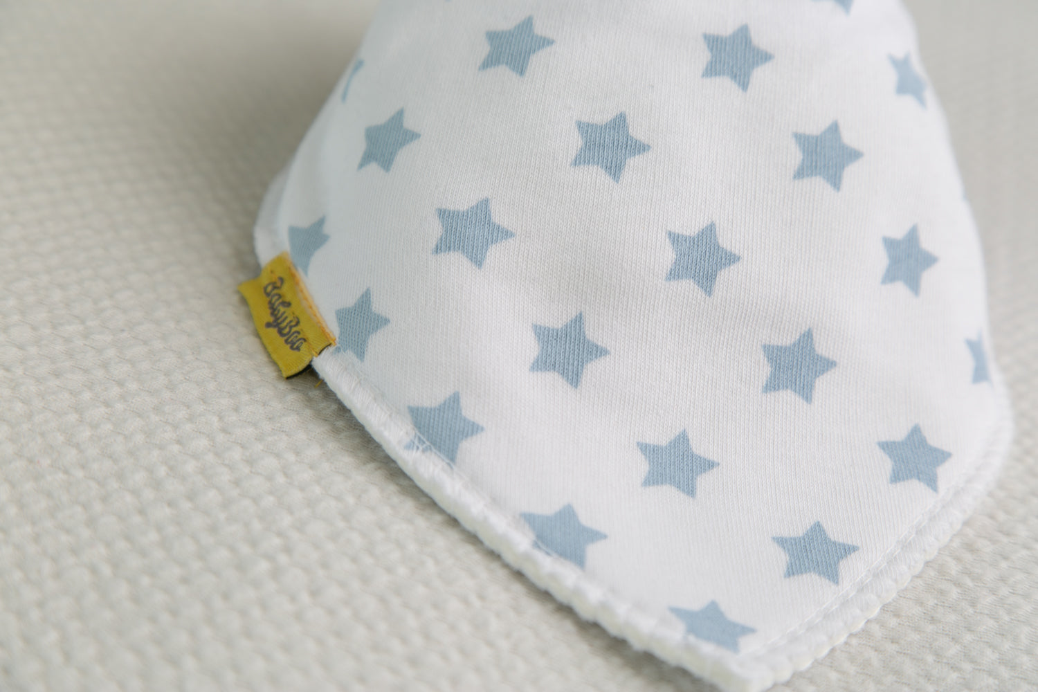 White with baby blue stars organic cotton DribbleBoo bandana bib
