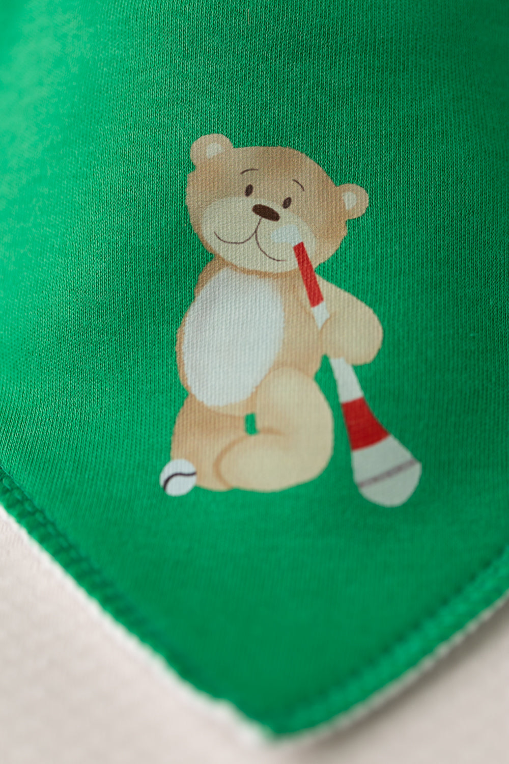 Puc about with Teddy organic cotton DribbleBoo bandana bib