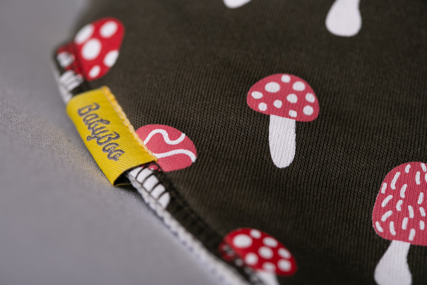 Forest green toadstools organic cotton DribbleBoo bandana bib