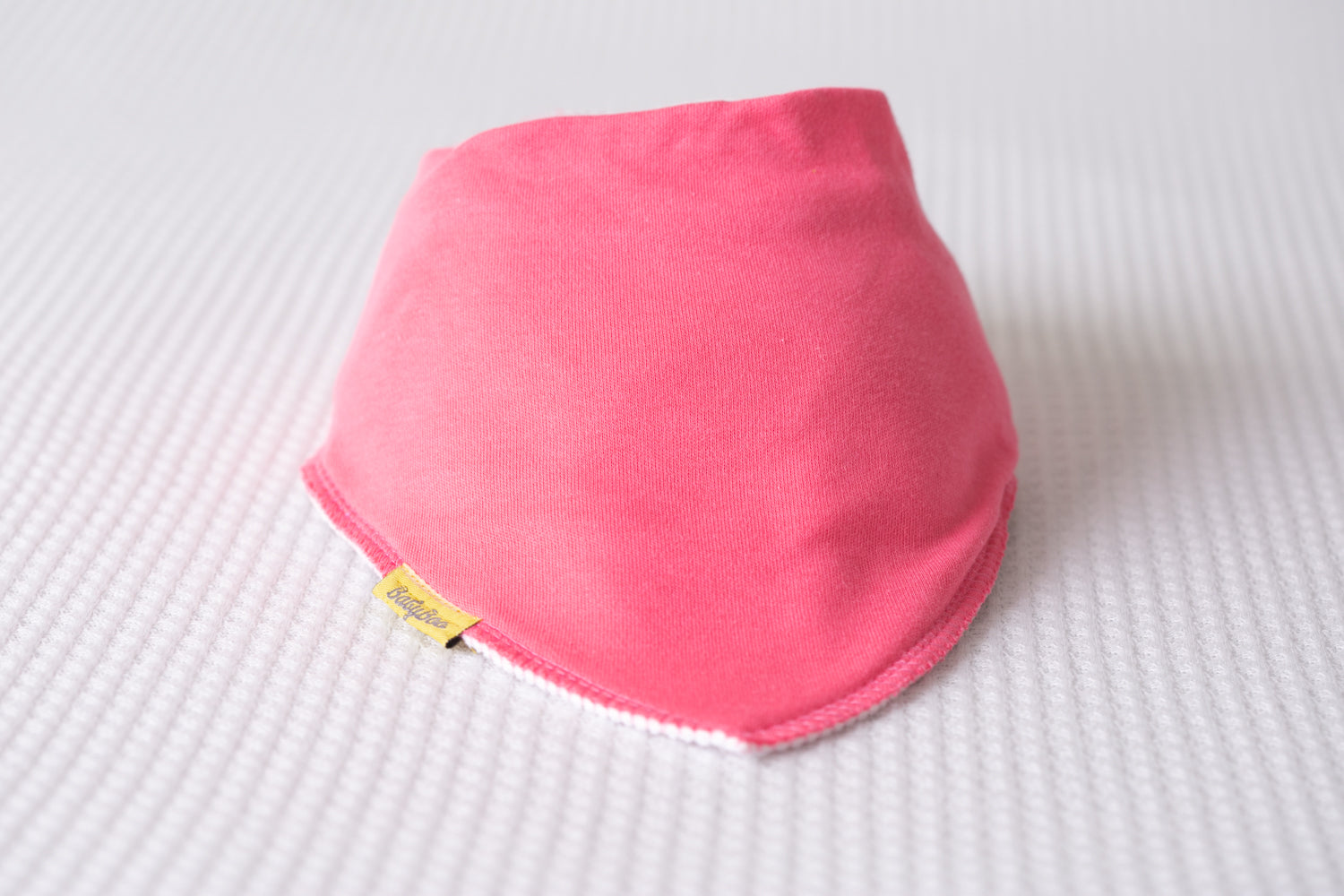 Big sister duties start Dec 2026 organic cotton DribbleBoo bandana bib